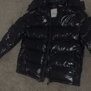 Selling a Size Medium authentic Moncler.